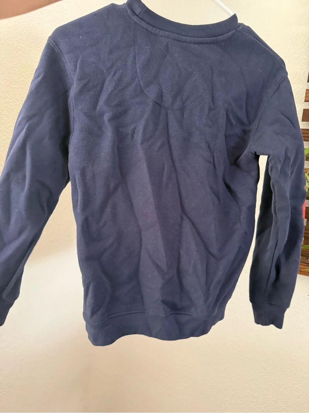 the Rolling Stones Navy Sweatshirt with Gold Script and Sleeve '72